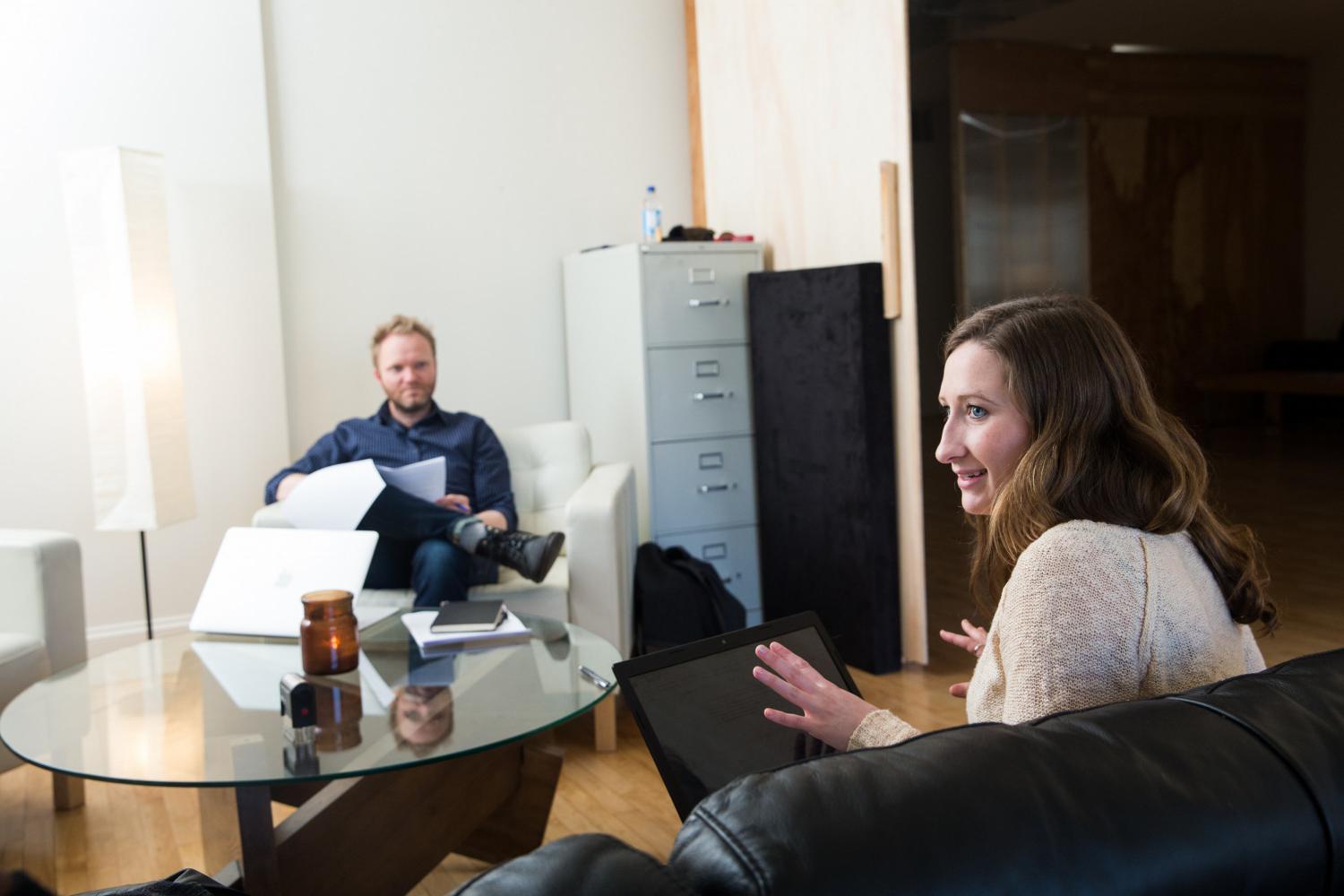 A Carthage College student works with her boss and colleagues during an off-campus internship with a video and marketing agency.